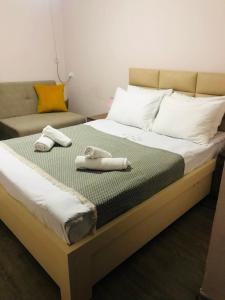 Postel nebo postele na pokoji v ubytování Borjomi inn