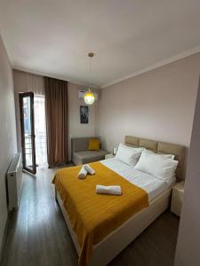 Postel nebo postele na pokoji v ubytování Borjomi inn