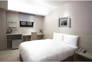 Kuchyň nebo kuchyňský kout v ubytování 宜都大飯店 Idol Hotel + 14 fotografií