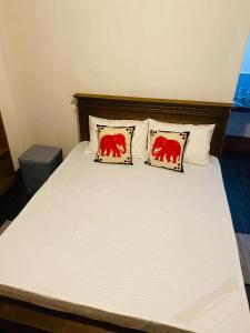 Postel nebo postele na pokoji v ubytování OneView Chalet