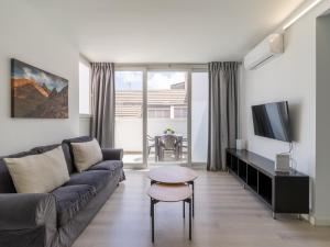 TV a/nebo společenská místnost v ubytování Penthouse Terrace city-sea view by CanariasGeytaway