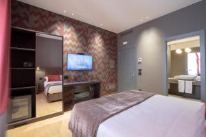 Postel nebo postele na pokoji v ubytování Re Sale Boutique Hotel