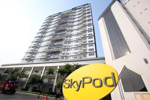 a large building with a sky pod sign in front of it at Beverly Puchong l 100M to IOI Mall in Puchong