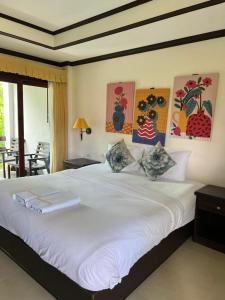Postel nebo postele na pokoji v ubytování Samui Seabreeze Place