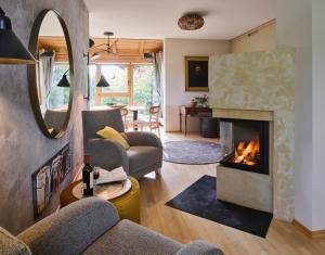 Posezení v ubytování Chalet Waging am See 4 Schlafzimmer
