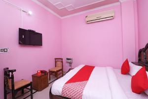 Ліжко або ліжка в номері Hotel Sagar