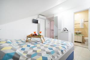 Postel nebo postele na pokoji v ubytování Apartments Milic + 36 fotografií