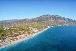 an aerial view of a beach and the ocean at Kalamata City Nest - Central & Cozy Hideout in Kalamata