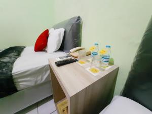 Postel nebo postele na pokoji v ubytování The Legian 777