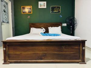 Postel nebo postele na pokoji v ubytování Tiny Homestay