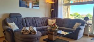 Posezení v ubytování Goldene Ruh - App 205 - in unmittelbarer Strandlage mit Seeblickbalkon