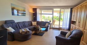 Posezení v ubytování Goldene Ruh - App 205 - in unmittelbarer Strandlage mit Seeblickbalkon