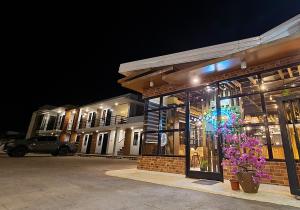 a store front of a building at night at Antonio's Inn in Calbayog City