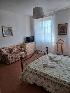 Postel nebo postele na pokoji v ubytování Casa di Adriano