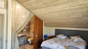 Postel nebo postele na pokoji v ubytování Guest House Vidlauči