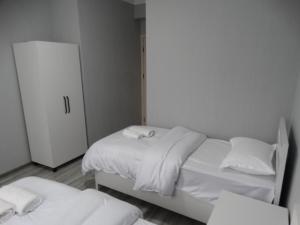 Rúm í herbergi á VST KHANOYAN'S HOTEL