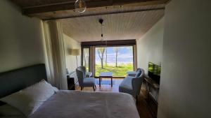 Postel nebo postele na pokoji v ubytování Guest House Vidlauči