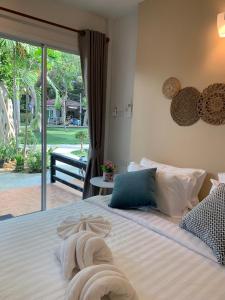 Postel nebo postele na pokoji v ubytování Samet Lucky Resort