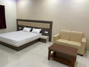 En eller flere senger på et rom på Hotel GR international
