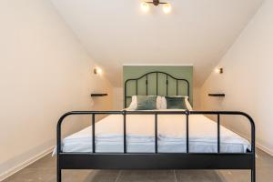 Ένα ή περισσότερα κρεβάτια σε δωμάτιο στο Master Road House
