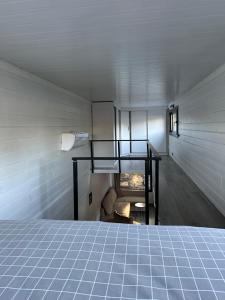 Krevet ili kreveti na kat u jedinici u objektu Gaia Tiny Houses Butik Hotel