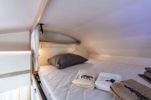 Postel nebo postele na pokoji v ubytování Autorulote Camperent