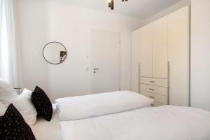 Postel nebo postele na pokoji v ubytování Ferienwohnungen Splendid