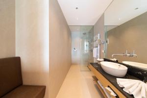 Koupelna v ubytování Apollo AchtQuartier Das Hotel am Mondsee + 37 fotografií