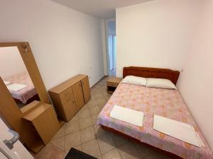 Postelja oz. postelje v sobi nastanitve Apartmani Vukcevic