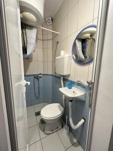 Kopalnica v nastanitvi Apartmani Vukcevic