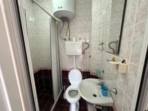 Kopalnica v nastanitvi Apartmani Vukcevic