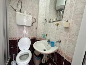 Kopalnica v nastanitvi Apartmani Vukcevic