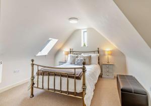 En eller flere senge i et værelse på Bow Well Lodge