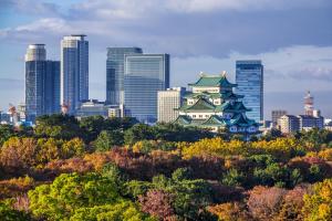 a city skyline with a pagoda in the foreground at Nagoya JR Gate Tower Hotel in Nagoya