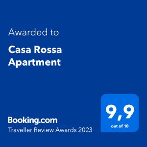 a blue sign with the text awarded to casa rosa apartment at Casa Rossa Apartment in Portorož