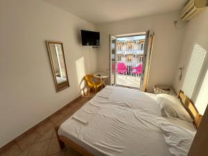 Postelja oz. postelje v sobi nastanitve Apartmani Vukcevic