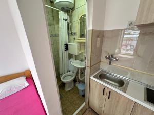 Kopalnica v nastanitvi Apartmani Vukcevic