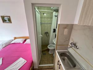 Kopalnica v nastanitvi Apartmani Vukcevic