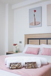 Cama o camas de una habitación en Alojamientos Rías Baixas-Casa Lisi-Ribeira