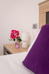 Cama o camas de una habitación en Alojamientos Rías Baixas-Casa Lisi-Ribeira