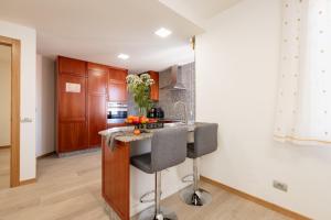 Una cocina o zona de cocina en Alojamientos Rías Baixas-Casa Lisi-Ribeira