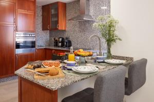 Una cocina o zona de cocina en Alojamientos Rías Baixas-Casa Lisi-Ribeira