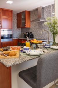 Una cocina o zona de cocina en Alojamientos Rías Baixas-Casa Lisi-Ribeira