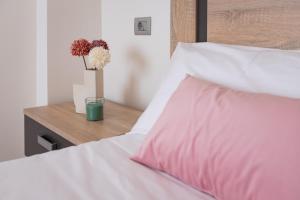 Cama o camas de una habitación en Alojamientos Rías Baixas-Casa Lisi-Ribeira