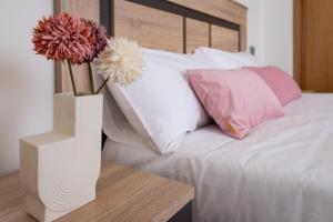 Cama o camas de una habitación en Alojamientos Rías Baixas-Casa Lisi-Ribeira