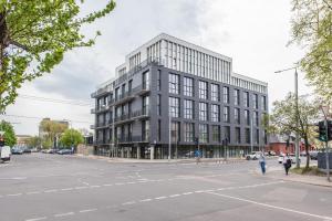 a large building on the corner of a street at Vilnius Cozy Loft in Vilnius