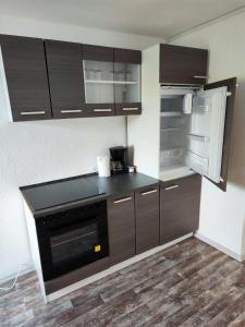 Η κουζίνα ή μικρή κουζίνα στο Monteurwohnung Haus Elbert 4