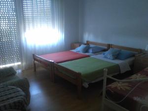 Posteľ alebo postele v izbe v ubytovaní Charlie Apartments