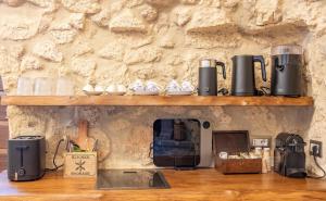 a room with a counter with two shelves at LA TORRE DELLA RIPA in Tarquinia