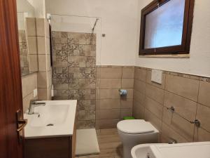 A bathroom at Villetta Sunrise 35